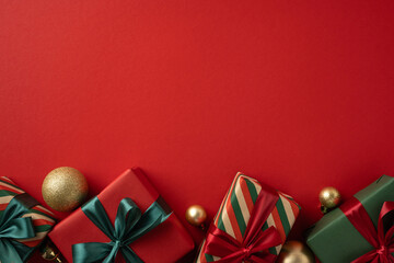 Decorative Christmas presents and ornaments neatly arranged below on a red backdrop. The scene embodies holiday spirit, showcasing the festive colors of red, green, and gold in a harmonious design