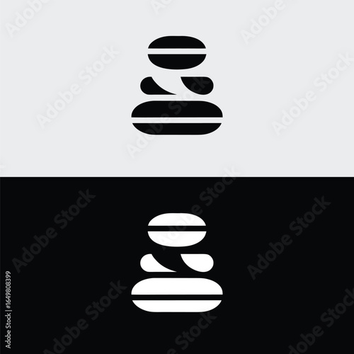 Zen stone stack isolated on white background is a symbol of balance, harmony and peace, perfect for spa, meditation or wellness related projects, with a minimalist and modern design