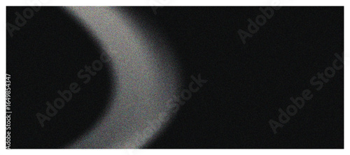 Abstract Light Circle: An evocative, minimalist composition features a luminous arc of light that gracefully curves against a backdrop of contrasting shadows.