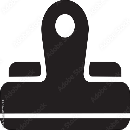 A simple black paper clip icon with a round hole on top against a white background in a studio shot