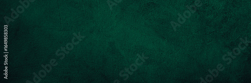 Black dark green blue emerald teal viridian texture background. Painted concrete wall surface. Grunge rough uneven plaster scratched damaged.Close-up.Design.Template.Blank.Wide banner.Panorama.