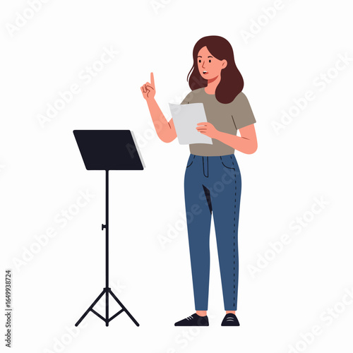Young woman presenting or speaking publicly, holding documents, gesturing with a raised finger, standing by a music stand.