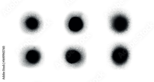 Abstract, grainy and noisy gradient spray shapes. Vector realistic, round design elements in black color