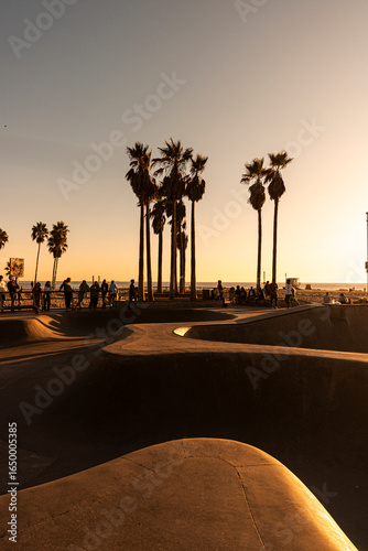 The most famous skate park on the world in Venice Beach during the sunset in Los Angeles.