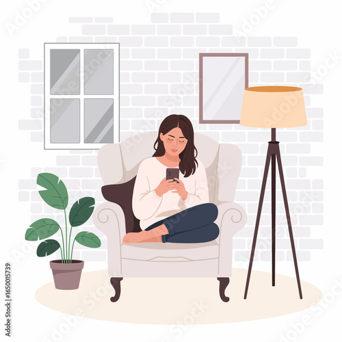 A young woman sits comfortably in a stylish chair, using her smartphone while surrounded by a leafy plant and warm lighting, capturing a tranquil home moment.