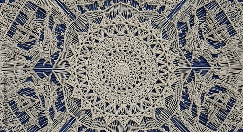 Detailed symmetrical knotwork pattern on a dark background.