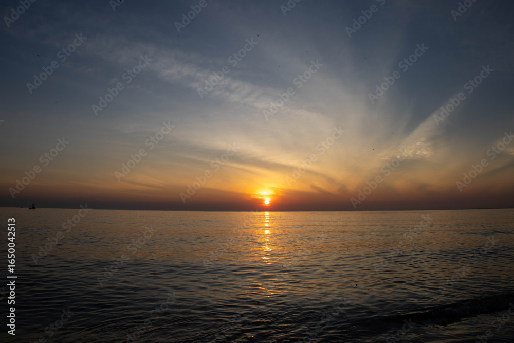 Fototapeta premium Beautiful sunset on the sea beach with coconut tree for travel in holiday
