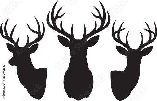 Three Black Silhouette Deer Heads With Antlers On White Background animal