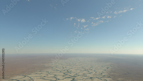 A cracked desert basin with grid lines, representing sudden ecological collapse.