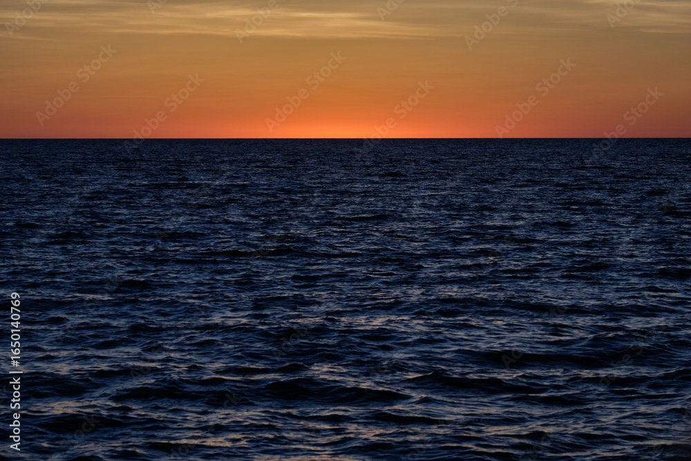 Fototapeta premium Sunset over the Indian Ocean - Broome, WA, Australia
