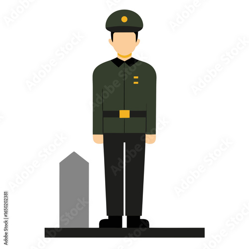 Soldier standing guard beside a monument