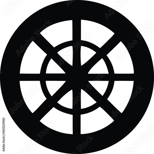 A stark black silhouette of the dharma chakra the wheel of law a significant buddhist symbol representing the teachings of the buddha