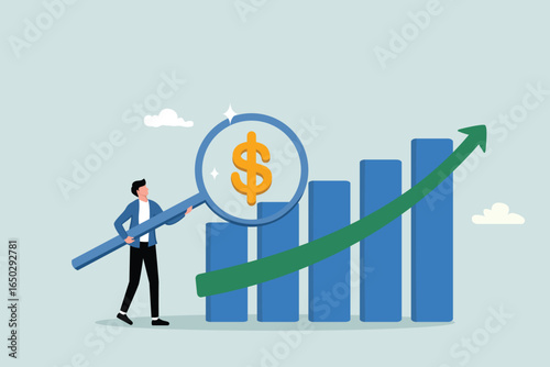 Revenue or salary increase, growth investment profit or earning from stock market, money or wages growing concept, businessman with magnifying glass on dollar money sign with growth graph and chart.