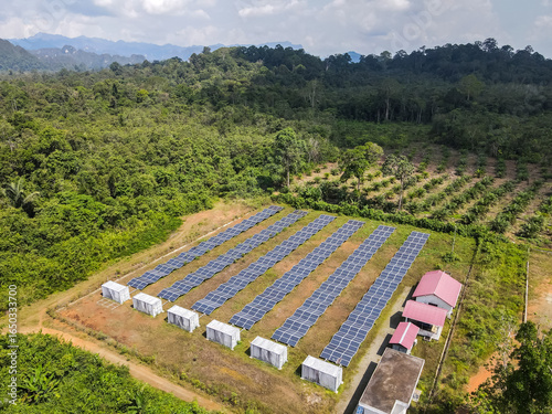 Installation of solar panels in the middle of agricultural and forest areas in the rural area of Merabu, Berau Regency, East Kalimantan, Indonesia. Solar panel technology is utilized for remote areas 