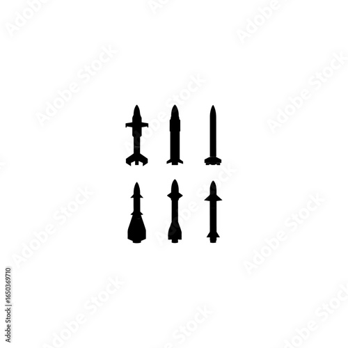 Silhouettes of ballistic missiles and rockets of various designs and sizes, displayed vertically isolated on transparent background.