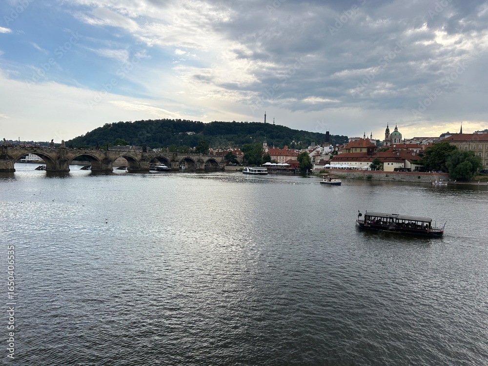 Obraz premium Vltava River in Prague with historic city view