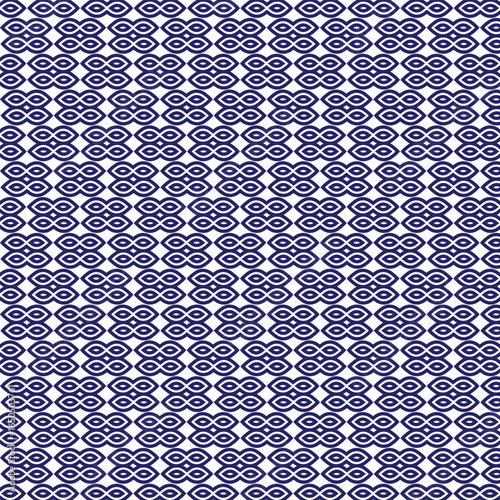 Intricate celtic knotwork pattern in deep blue and white repeating geometric design