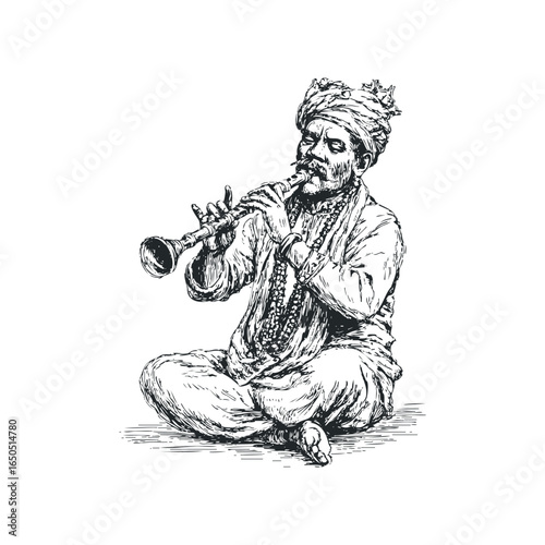 Indian man in traditional attire playing wind instrument while seated cross-legged