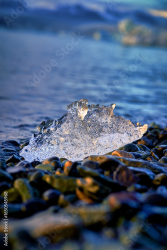 The ice on the black stone beach in jokulsarlon glacier lagoon , Travel road trip in Iceland.