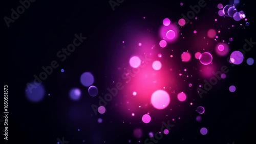 Glowing abstract bokeh lights in shades of pink and purple on a dark background, creating a dreamy and magical atmosphere.  