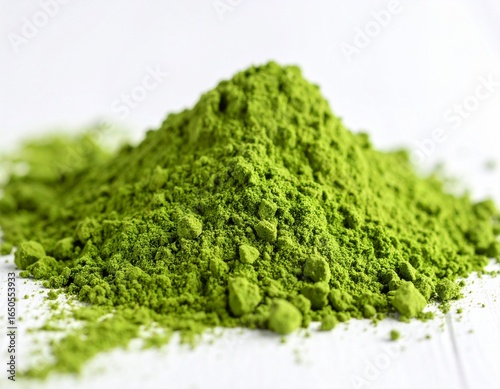 A close-up of ceremonial matcha being prepared, showcasing its rich color and fine texture perfect for themes of natural energy, and mindful rituals. Versatile matcha powder, white background 