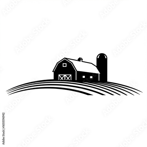 Black and White Silhouette of a Barn and Silo on Rolling Hills