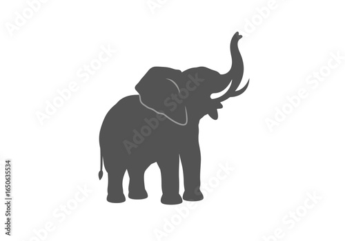 Gray elephant silhouette with raised trunk on white background