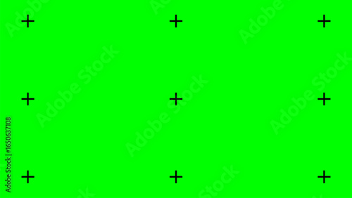 Bright green screen background with nine black tracking markers arranged in a 3x3 grid, ideal for chroma keying, video editing, and post production. for compositing digital elements or special effects