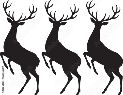 Three Black Silhouette Deer Standing on Hind Legs with Antlers animal wildlife