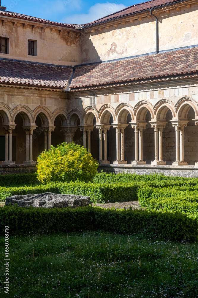 Fototapeta premium Garden of the inner cloister of the Abbey of Santa Maria and San Andres de Arroyo in Palencia