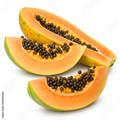 A whole ripe papaya and two slices showing its juicy orange flesh and black seeds isolated on white background