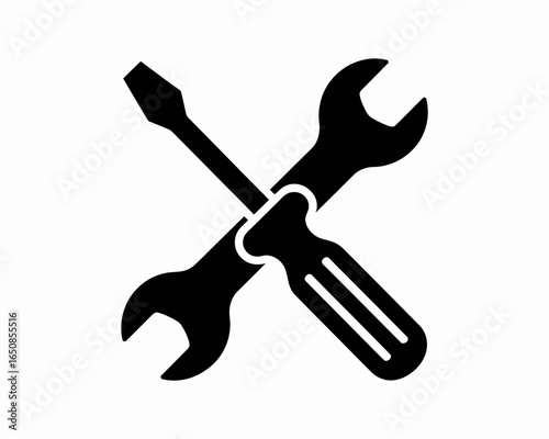 Black silhouette of a wrench and screwdriver crossed together isolated on white background silhouette