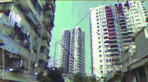 Urban cityscape with high rise buildings and digital glitch overlay creating distorted effect