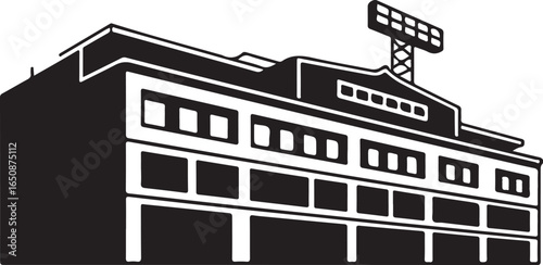Modern stadium building with scoreboard and bright lights