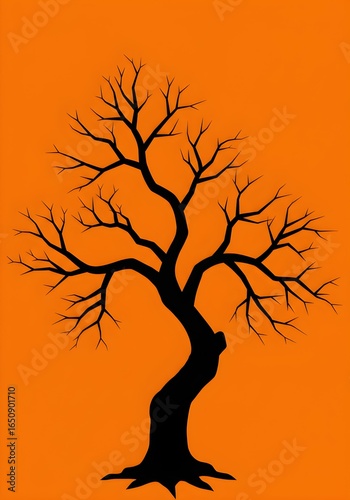 Silhouette of a Bare Tree on Orange Background.