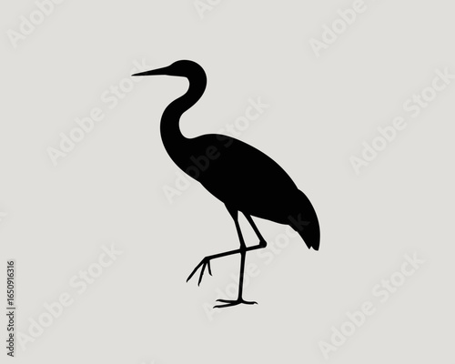 Elegant heron silhouette standing on one leg isolated on white background