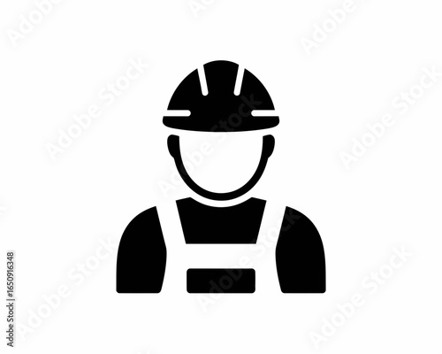Black silhouette of a construction worker wearing a hard hat and overalls isolated on white background silhouette