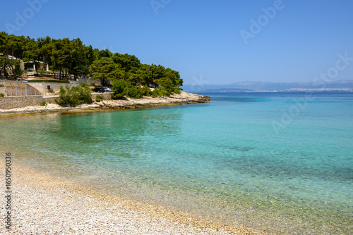 Fototapeta Naklejka Na Ścianę i Meble -  Likva Bay with a beautiful pebble beach located near Sutivan on the island of Brac. Croatia