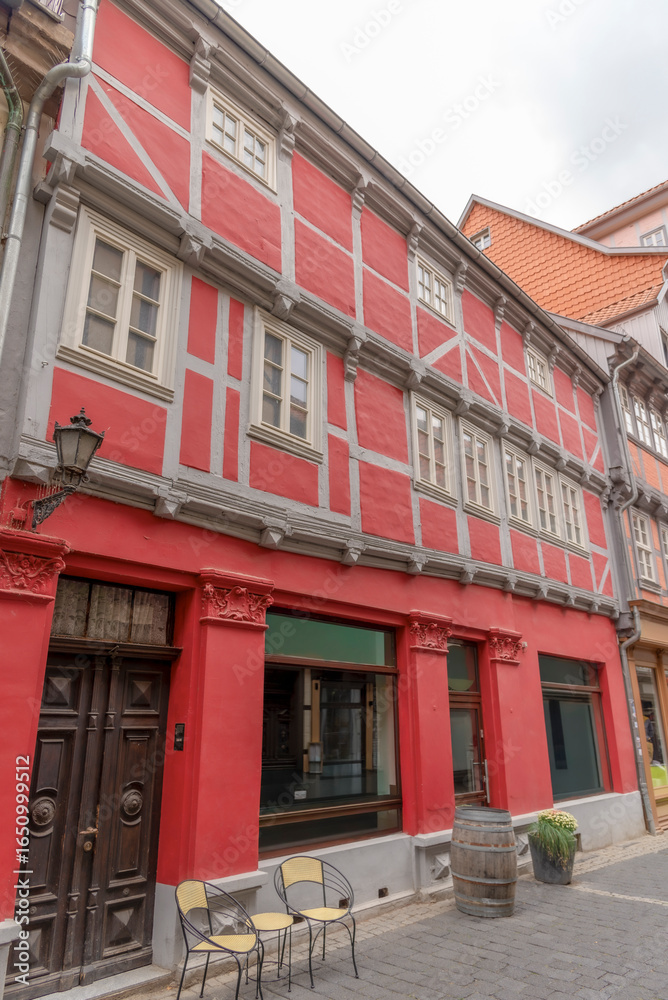 Fototapeta premium Old red house in the town of Ribe, the oldest town in Denmark. Half-timbered and barred windows 2021