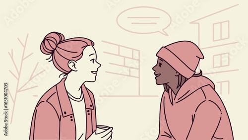 Two young women talking and smiling outdoors with a speech bubble above them