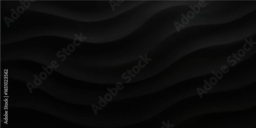 Black satin and silk fabric background with smooth flowing texture and luxury design