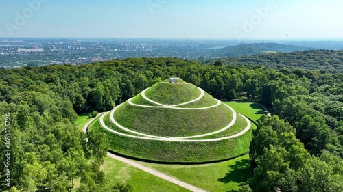 Piłsudski’s Mound in Kraków, Poland. The highest artificial mound in Poland. Erected 1934-1937 to commemorate marshal Józef Piłsudski and Independence of Poland. Aerial video. Cracow in the background