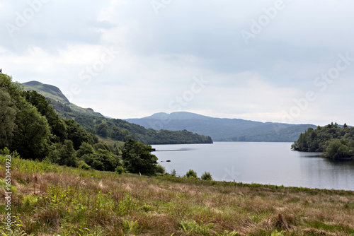 Wallpaper Mural View of Loch Katrine looking south east from the shore path near Portnellan to distant Beinn Bhreac. Loch Lomond and the Trossachs National Park, Southern Highlands of Scotland. Torontodigital.ca