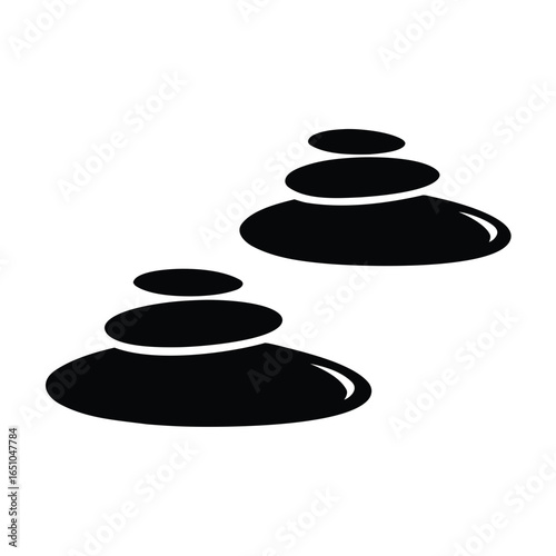 Two balanced stacked stones silhouette