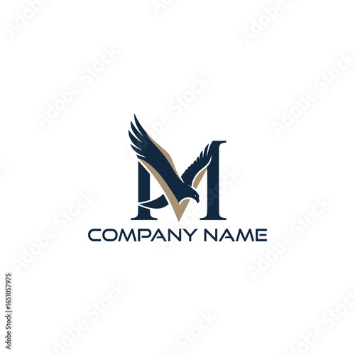 Majestic eagle soars above letter m logo isolated on white background
