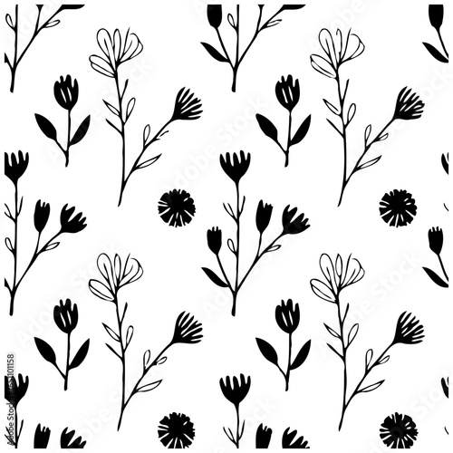 Botanical black and white seamless pattern with wildflowers to enhance textile designs and backgrounds beautifully