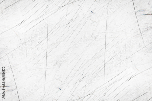 金属やフィルムを思わせる繊細な傷模様の背景素材
