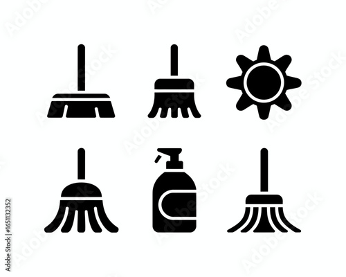 Collection of cleaning tool icons including brooms and spray bottle silhouette isolated on white background