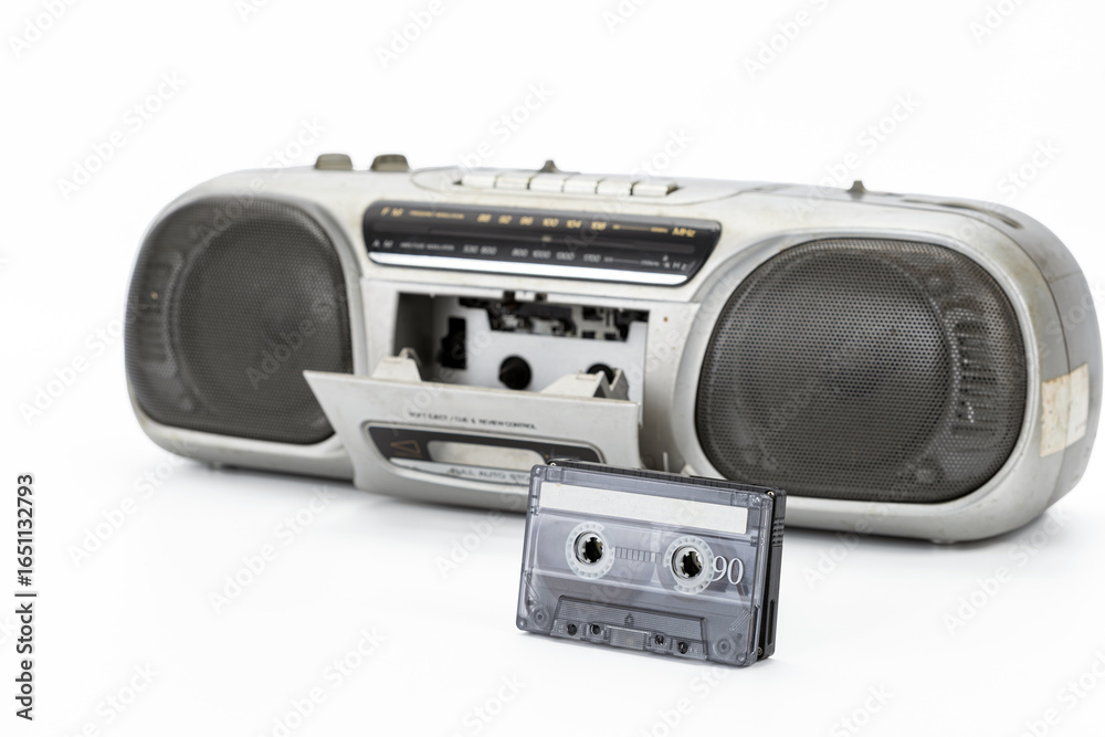 Fototapeta premium Vintage cassette player with open tape deck, retro audio system, nostalgic old technology on white.