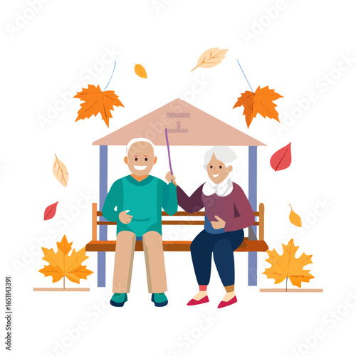 Elderly couple enjoying autumn weather sitting under a gazebo surrounded by falling maple leaves